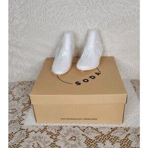 Empty shoe box from Soda with Styrofoam Shoe Inserts